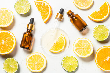 Vitamin C. Cosmetic products and fresh citrus fruits.
