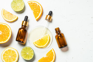 Vitamin C. Cosmetic products and fresh citrus fruits.