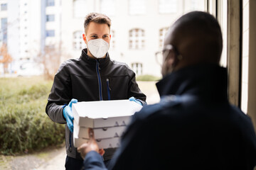 Receiving Pizza From Delivery Man