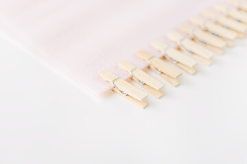 blank sheet and linen chips on white background. Empty space for text. Flat lay top-down