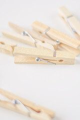 wooden clothespin on white. Decorative chips on a white background