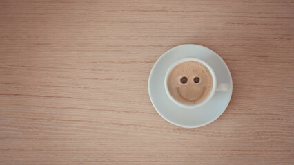 smiling coffee saying good morning to have a happy day