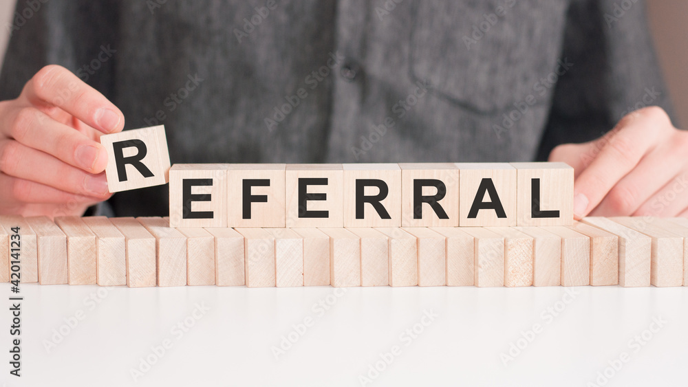Poster the word of referral on building blocks concept