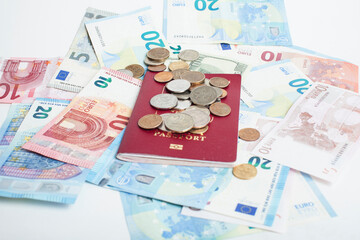 Cash on table isolated: dollars, euro, rubl broken money. All in mess, global crisis . passport travel concept