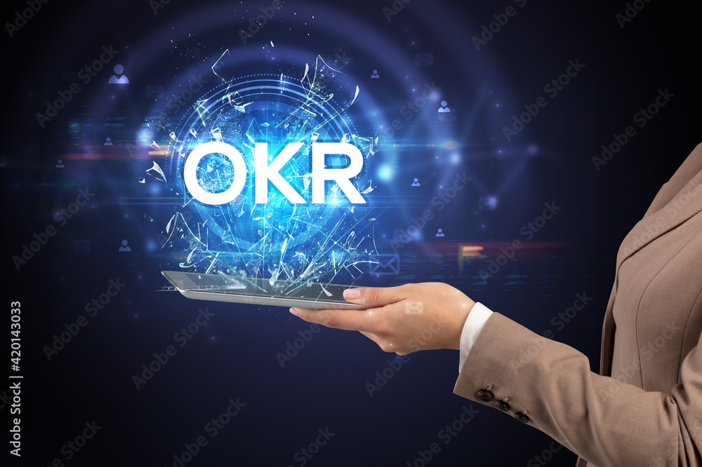 Poster close-up of a touchscreen with abbreviation.