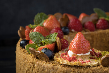 bisquit cake with cream strawberry and sugar powder