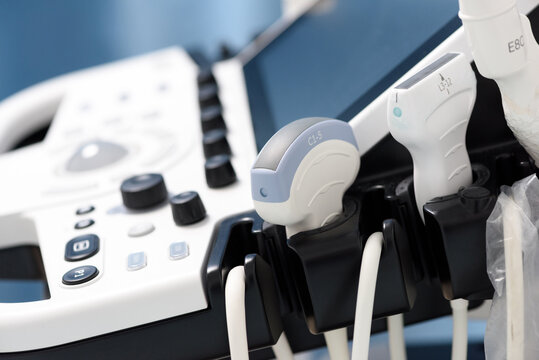 Medical Equipment In The Clinic. Modern Ultrasound Machine, Scanners And Sensors Close-up.