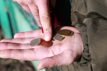 Old coins of India in hand