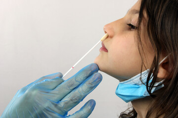 Girl doing a PCR test