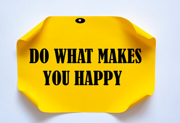 Do what makes you happy written on color sticker notes over cork board background.
