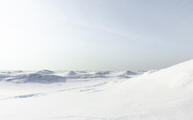 Fototapeta na wymiar Winter hills of the sea