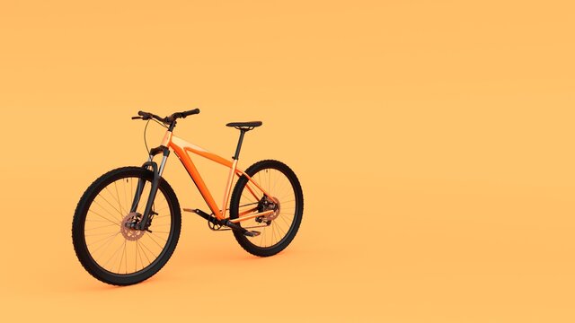 Orange Mountain Bike Bicycle Isolated On Yellow Background	