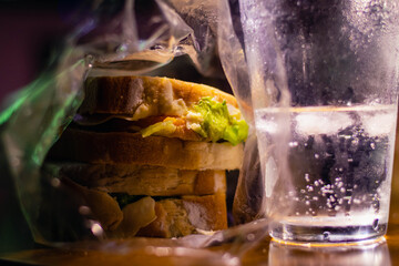 close-up of sandwich on wooden base