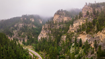 Fog in the morning on Spearfish Canyon Scenic Byway, South Dakota Black Hills	