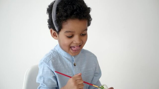 coloring eggs on ester and having fun alone