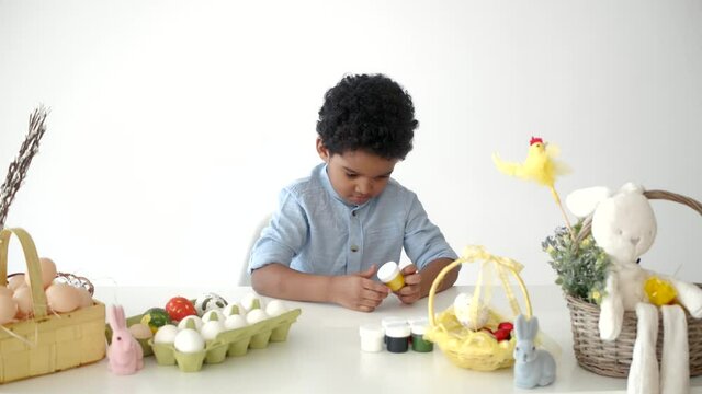 coloring eggs on ester and having fun alone