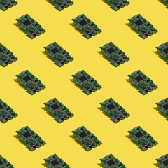 Fototapeta premium Motherboard of hardware data storage seamless pattern on yellow background. Computer technologies backdrop. 
