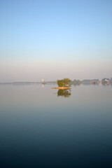 Dawn Lake with a Tree in the Middle