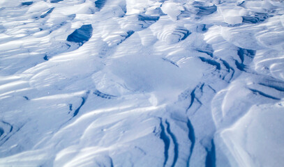 Fototapeta na wymiar relief on snow cover after a blizzard