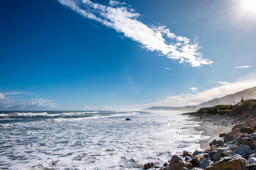 Ocean surf on a remote beach. South Island, New Zealand.