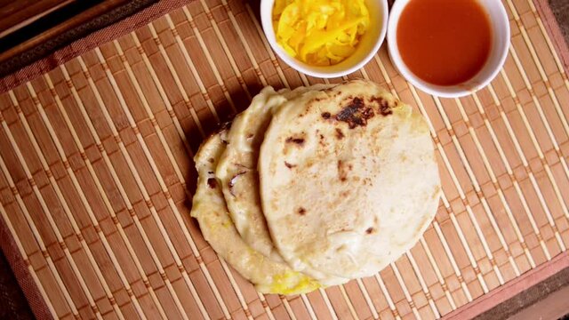 Pupusas from el salvador cental america traditional dish, spinning top view