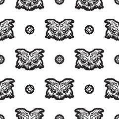 Black-white Seamless pattern owl face in boho style. Isolated. Good for clothing and textiles. Vector