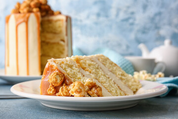 Plate with piece of tasty cake on color background, closeup
