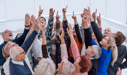 a group of people in years show thumb up