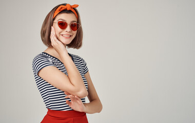 cheerful pretty woman with orange headband red skirt fun Studio