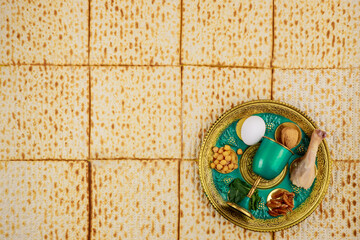 Jewish matzah, kiddush and seder with egg, bone, herbs and walnuts. Passover concept.
