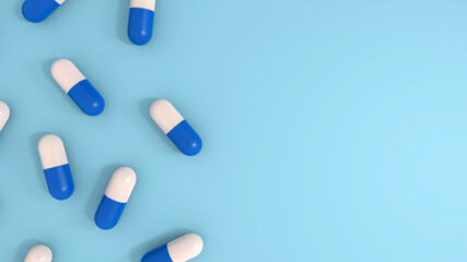 Prescription medication, pharmaceutical treatment and pain management concept with white blue pills capsules isolated on blue background