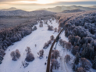 Beatiful winter landscape in Harghita, Romania from above with drone