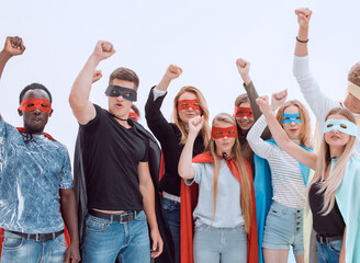 close up. a variety of young people in capes superhero standing together