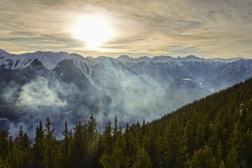 Thick Smoke from Prescribed Forest Fire Burn above Sundance Mountain Range in Banff National Park, Canadian Rockies