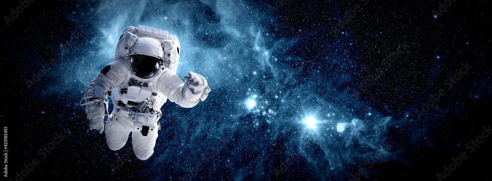 Wall mural astronaut spaceman do spacewalk while working for space station in outer space . astronaut wear full