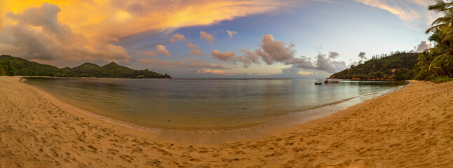 Sunset view of Baie Lazare beach on Mahe Island in the Seychelles