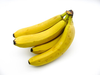 A bunch of yellow fresh ripe bananas on a white background
