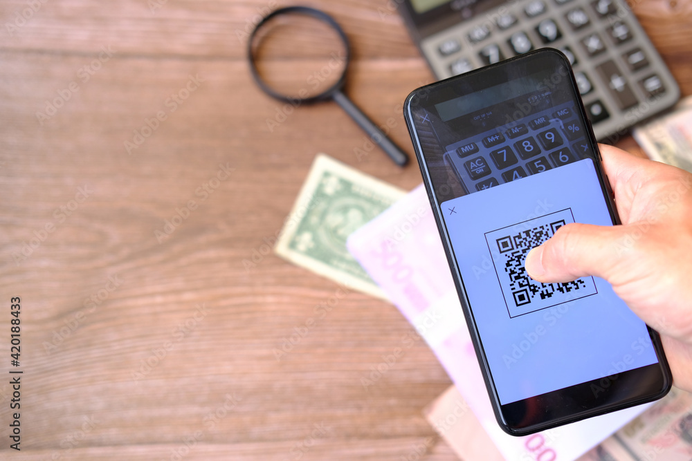 Poster hands holding smartphone and using qr code payment