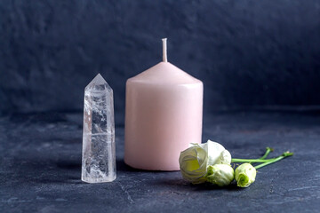 Magic vintage still life with crystals, pink candle and rose flowers. Meditation reiki. Ritual for...