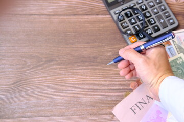 hand with calculator