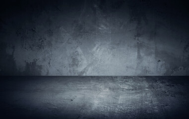Dark room in beam of light with concrete wall and floor. Texture background image