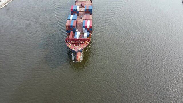 Aerial view of Cargo ship. Large container ship at Estuary.