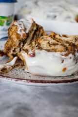 cinnabons with cinnamon and cream