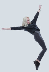 Naklejka premium in full growth. happy young modern woman.