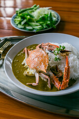 
Food Concept: Southern Thai dish of Crabmeat Curry traditionally served with fermented rice noodle