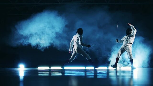 Slow motion of a fencing match between two athletes