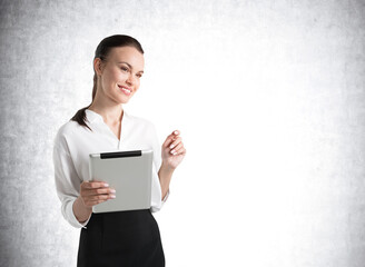 Mockup empty wall and woman with tablet on grey background