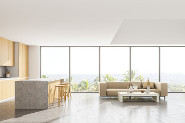 Wooden kitchen set with sofa and coffee table near panoramic window