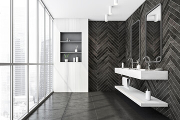 Two sinks with mirrors and tiled floor