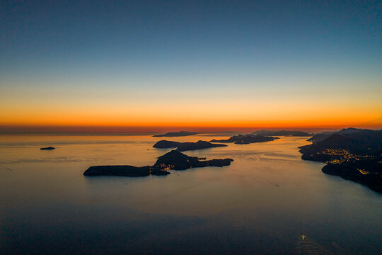 Aerial drone shot of post sunset over Adriatic sea view from Babin Kuk hill in Dubrovnik Croatia summer